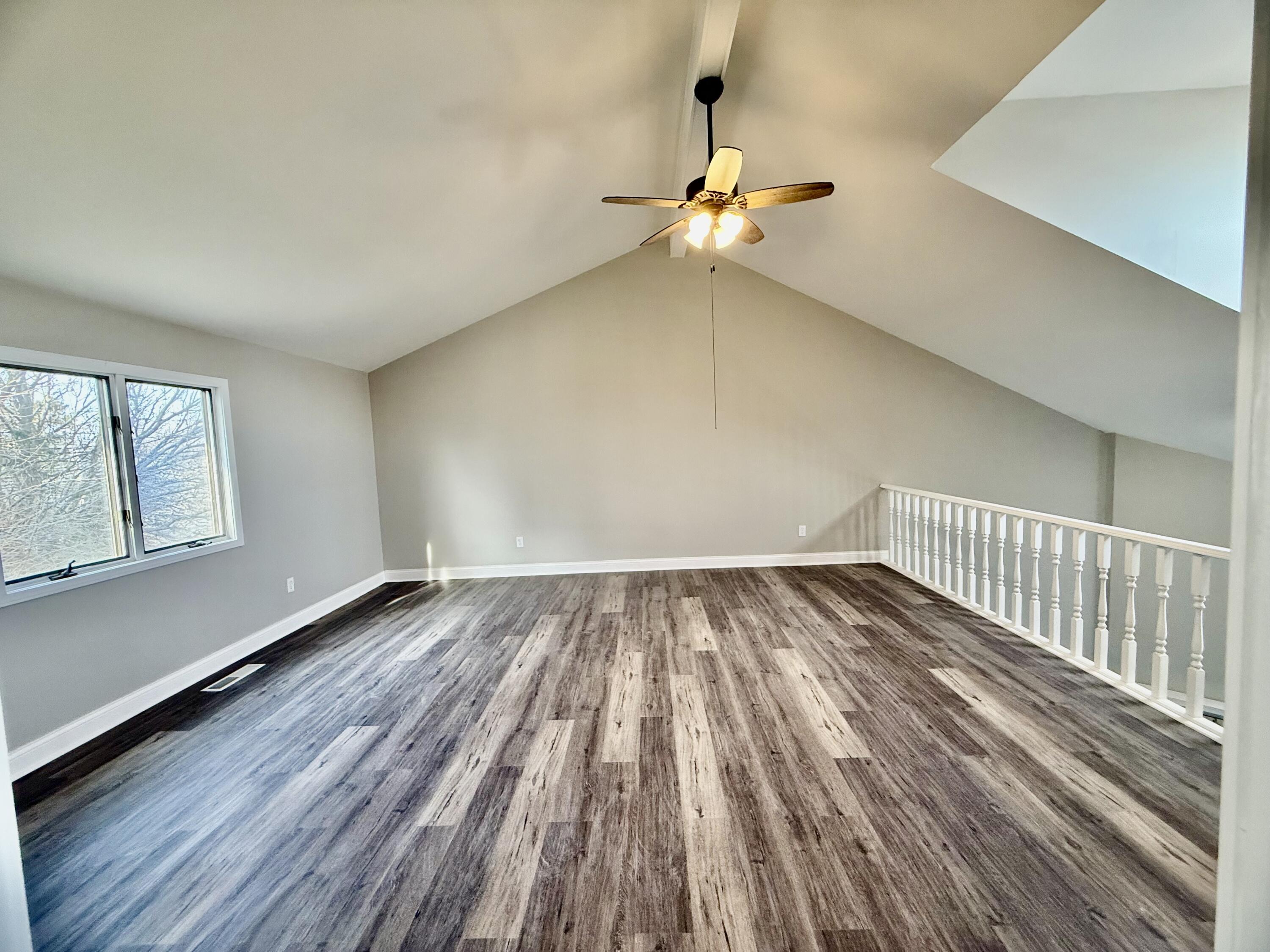 1962 Aspen Court Crown Point, IN 46307 - Photo 21 of 27 a view of a room with wooden floor and window