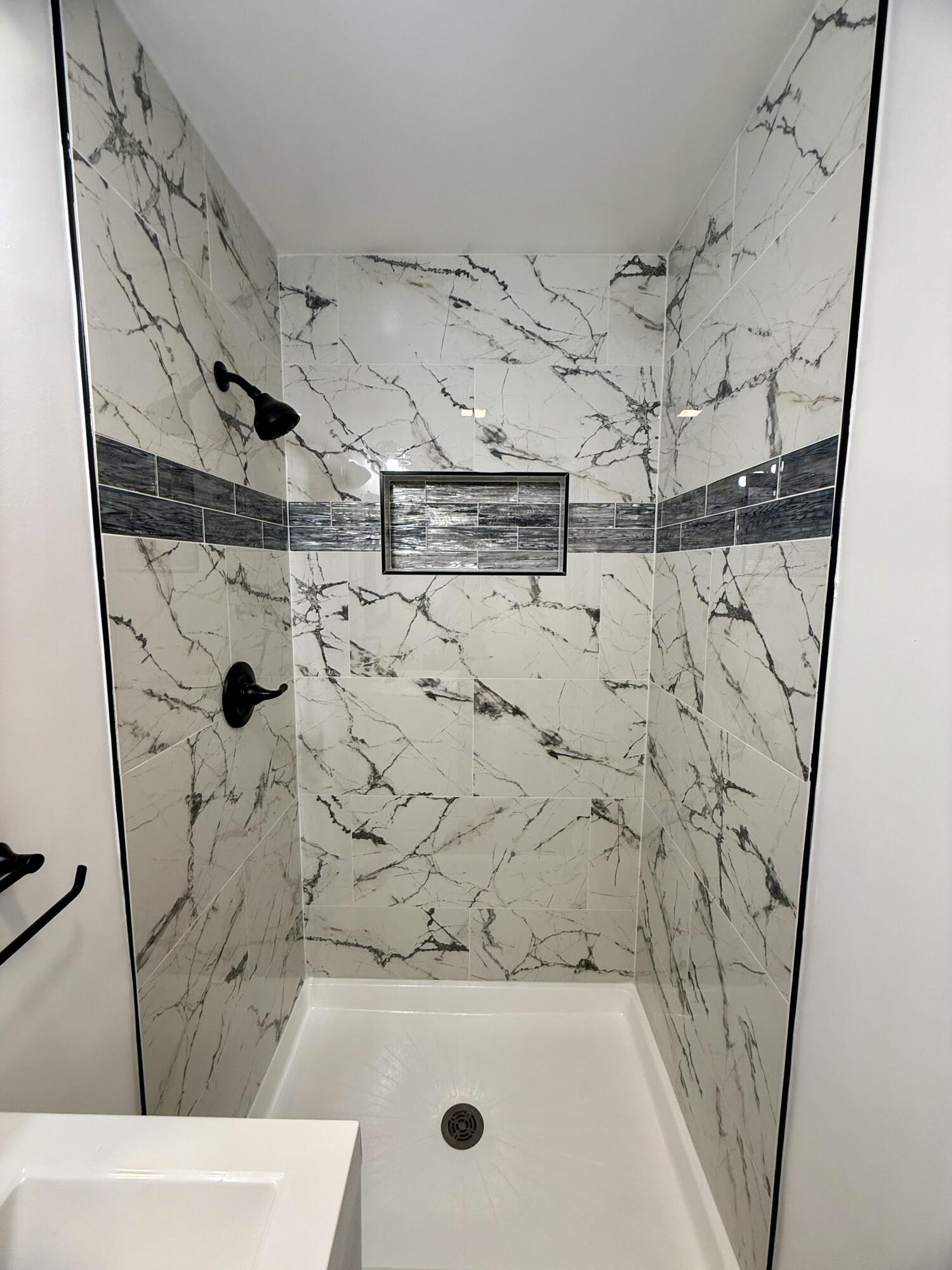 1962 Aspen Court Crown Point, IN 46307 - Photo 25 of 27 a bathroom with a bathtub and shower