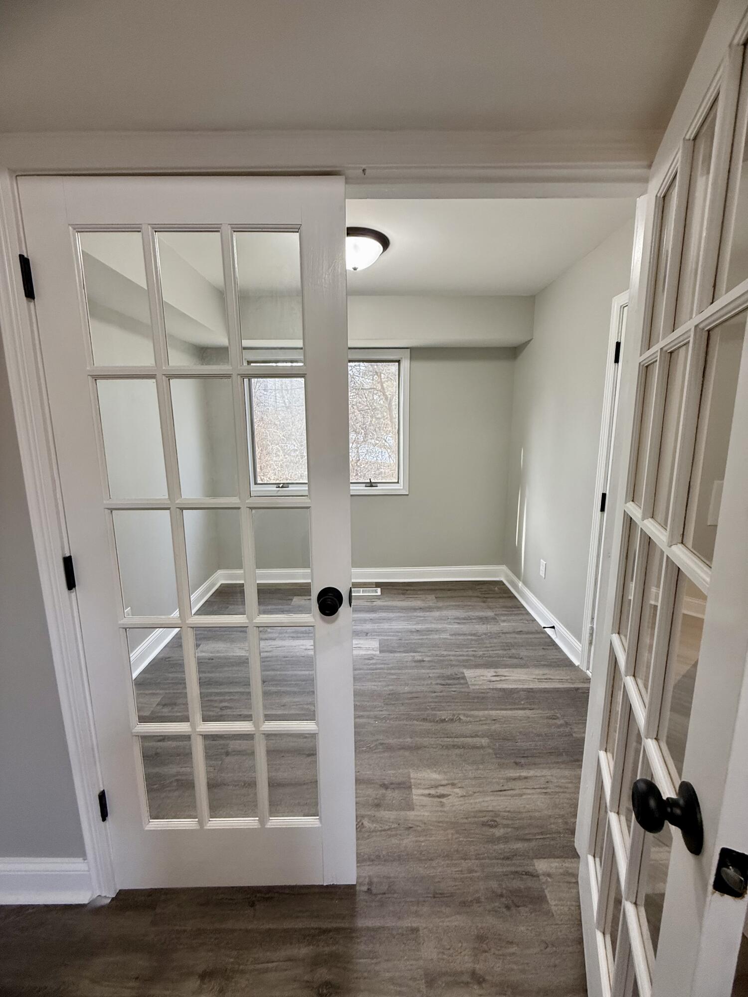 1962 Aspen Court Crown Point, IN 46307 - Photo 10 of 27 a view of an empty room with wooden floor and a window