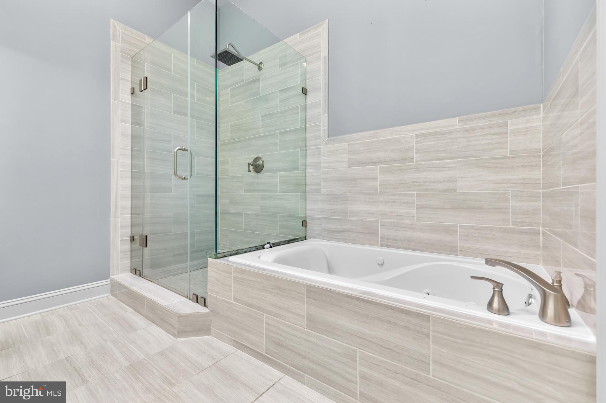 151 V Street Northwest, Unit 4 Washington, DC 20001 - Photo 34 of 49 a bathroom with a bathtub