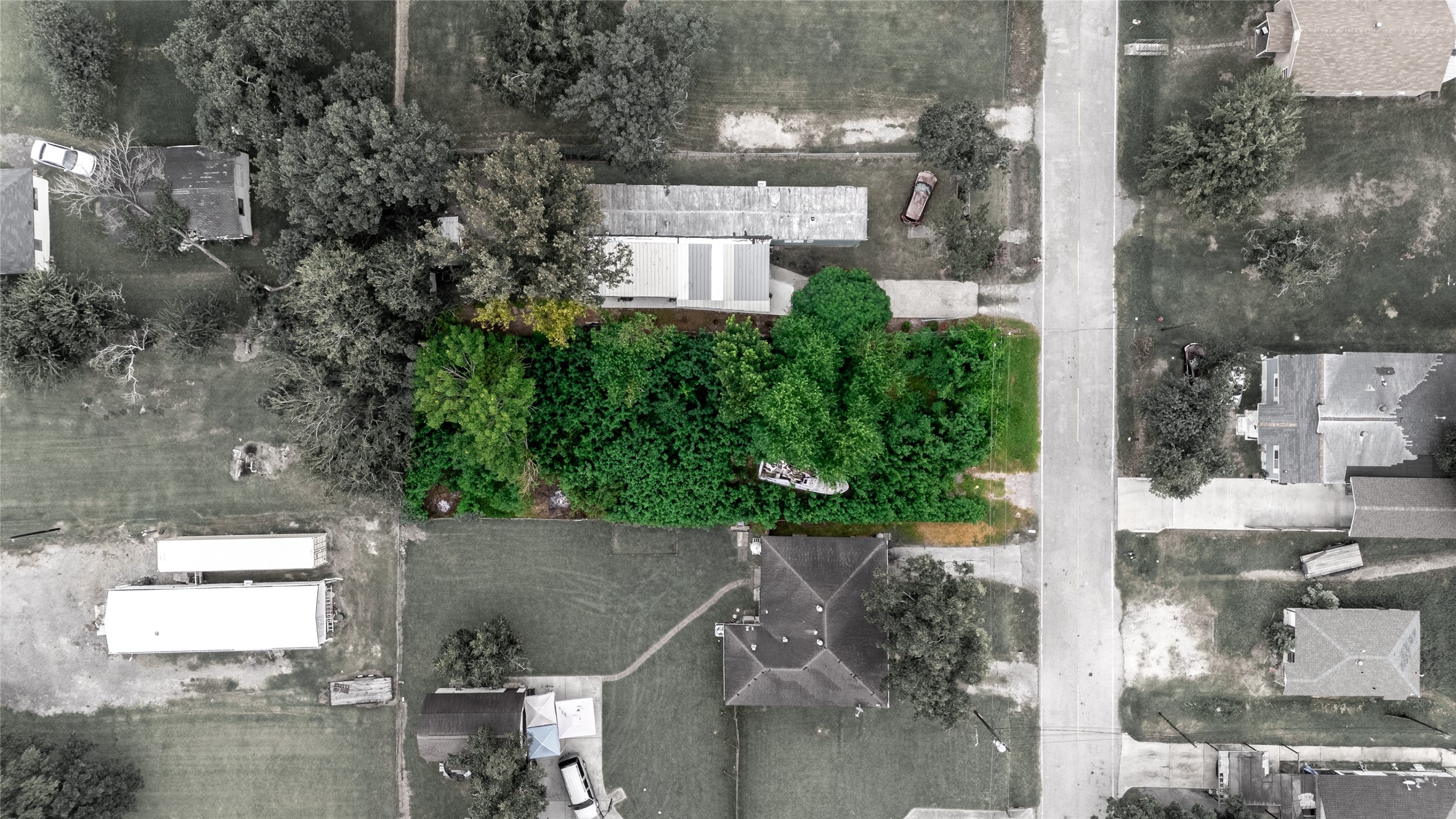 7731 North Perry Street Baytown, TX 77521 - Photo 3 of 8 an aerial view of a house with outdoor space