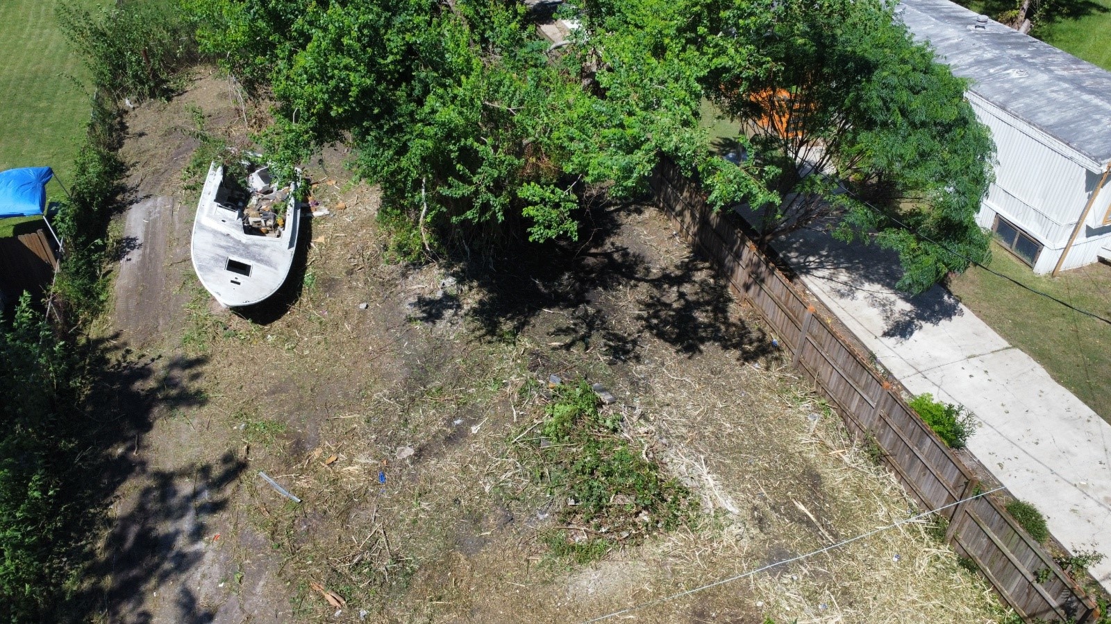 7731 North Perry Street Baytown, TX 77521 - Photo 8 of 8 an aerial view of a house with a yard