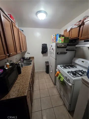 a bed room with bed and a night stand