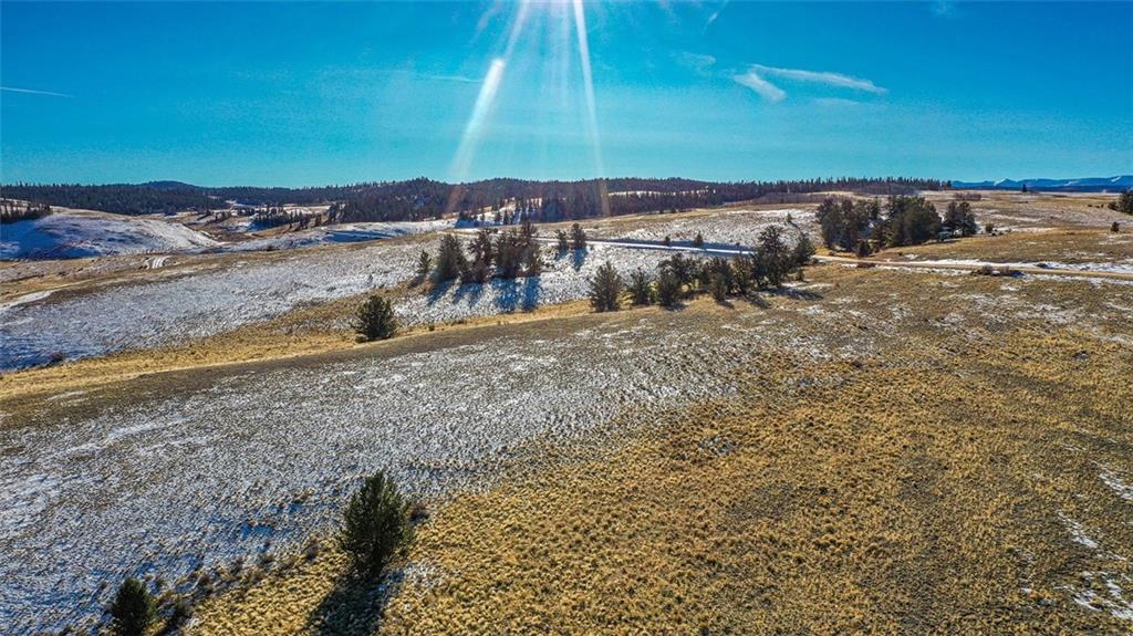 839 Arland Road Como, CO 80432 - Photo 11 of 21 a view of a dry yard with wooden fence