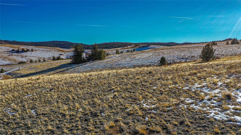 839 Arland Road Como, CO 80432 - Photo 16 of 21 a view of car parked on the road