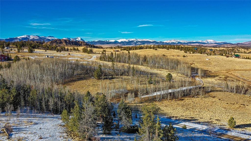 839 Arland Road Como, CO 80432 - Photo 7 of 21 a view of a lake with a city
