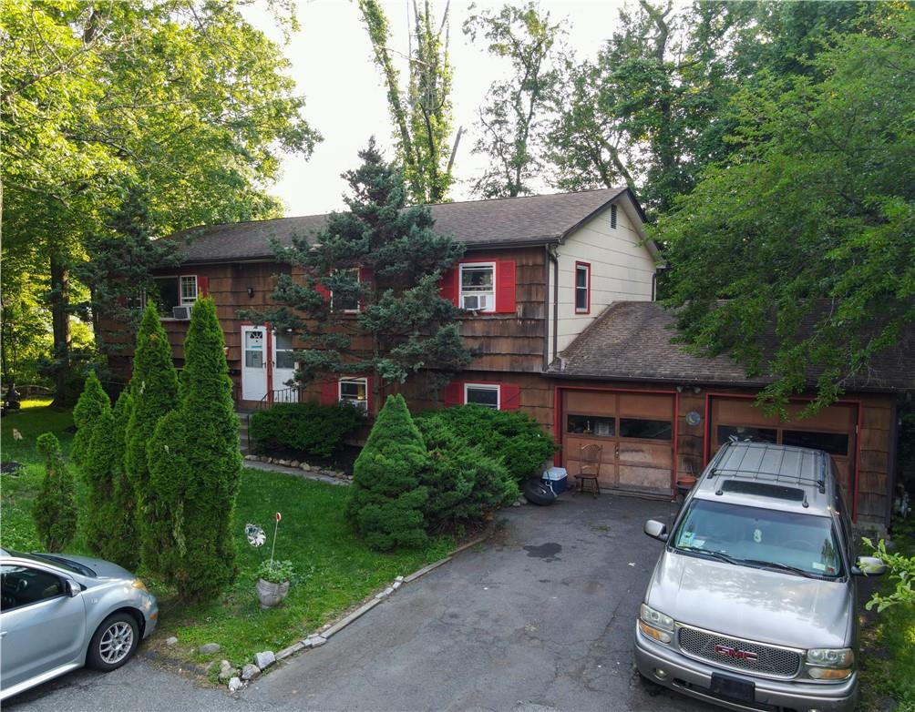 15 Garden Street Chestnut Ridge, NY 10977 - Photo 1 of 1 a front view of a house with a yard