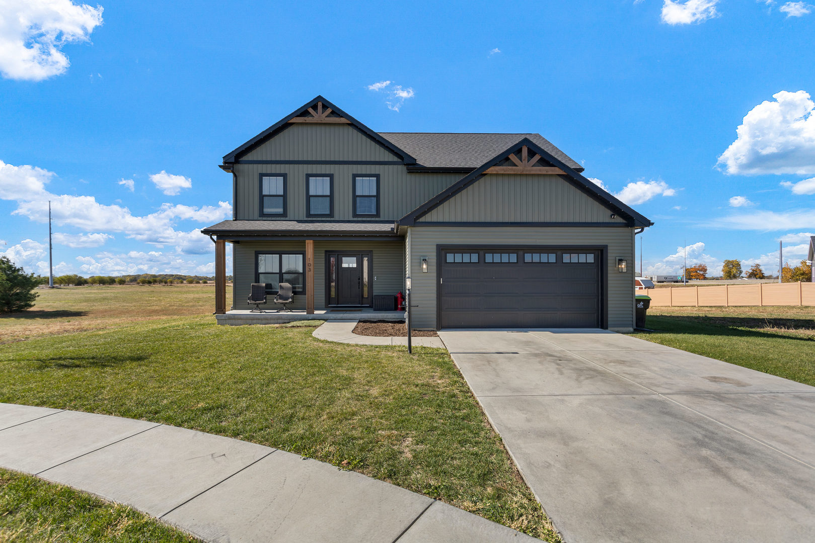 103 Wildflower Heyworth, IL 61745 - Photo 1 of 39 a front view of a house with garden