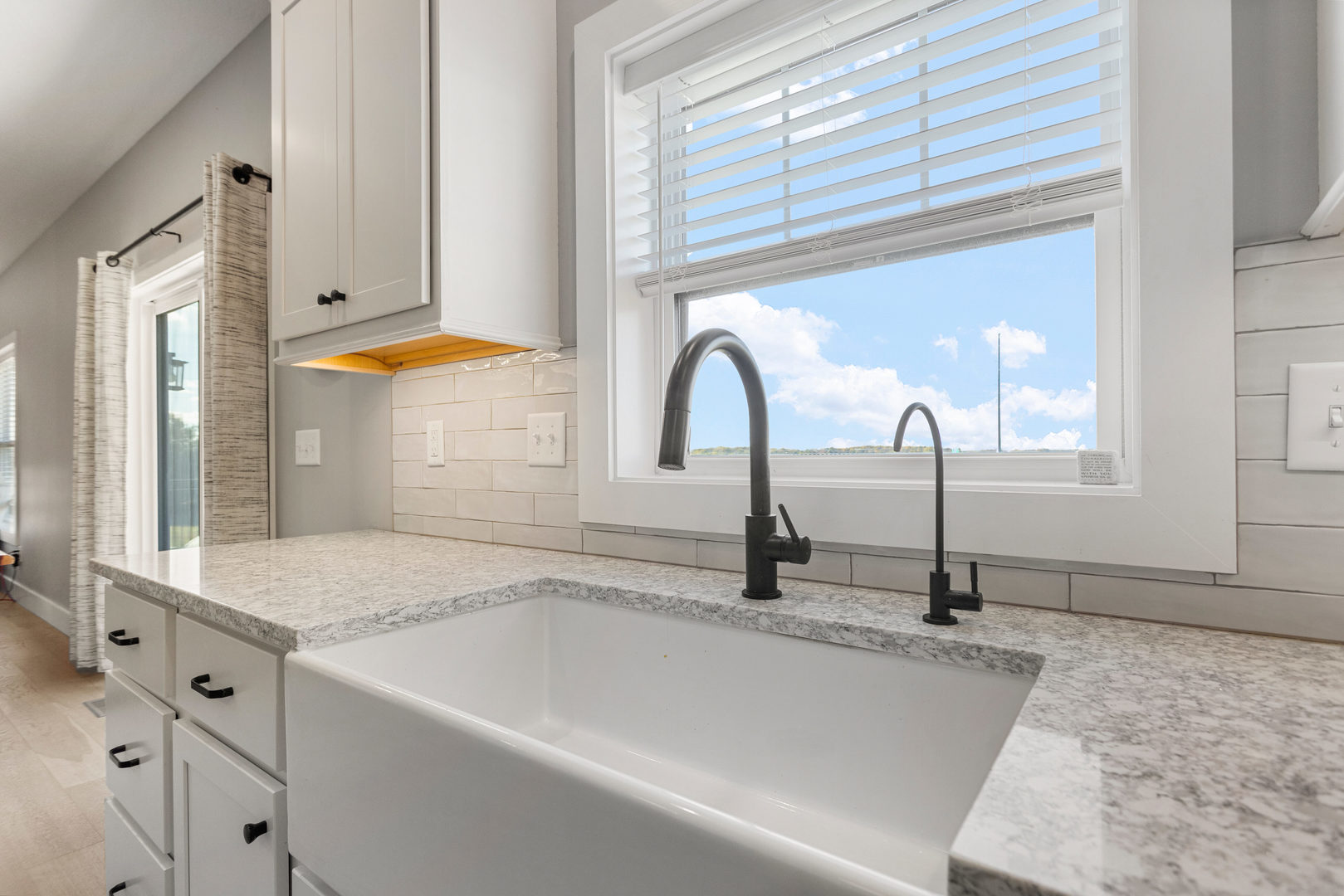103 Wildflower Heyworth, IL 61745 - Photo 15 of 39 a bathroom with a tub sink and mirror