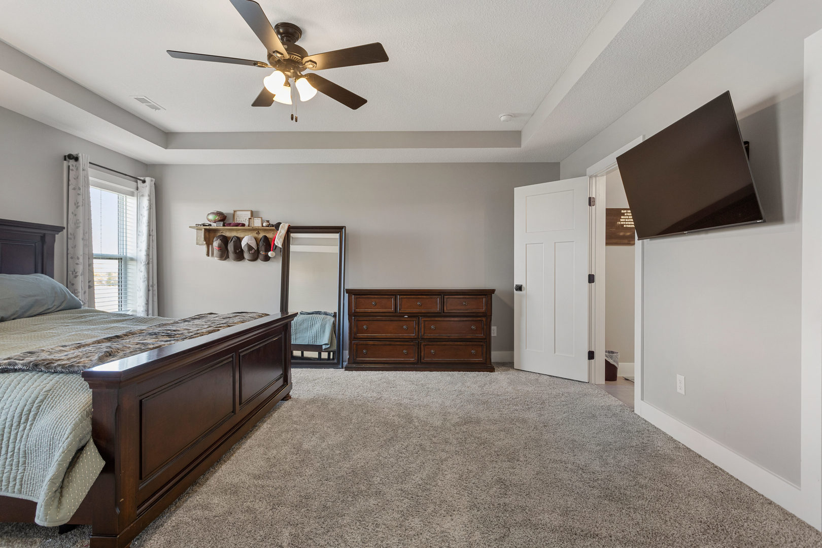 103 Wildflower Heyworth, IL 61745 - Photo 16 of 39 a living room with furniture and a flat screen tv