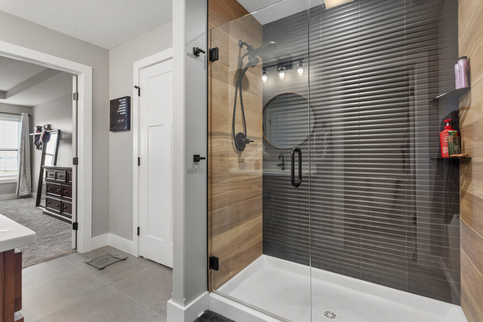 103 Wildflower Heyworth, IL 61745 - Photo 20 of 39 a bathroom with a sink and shower