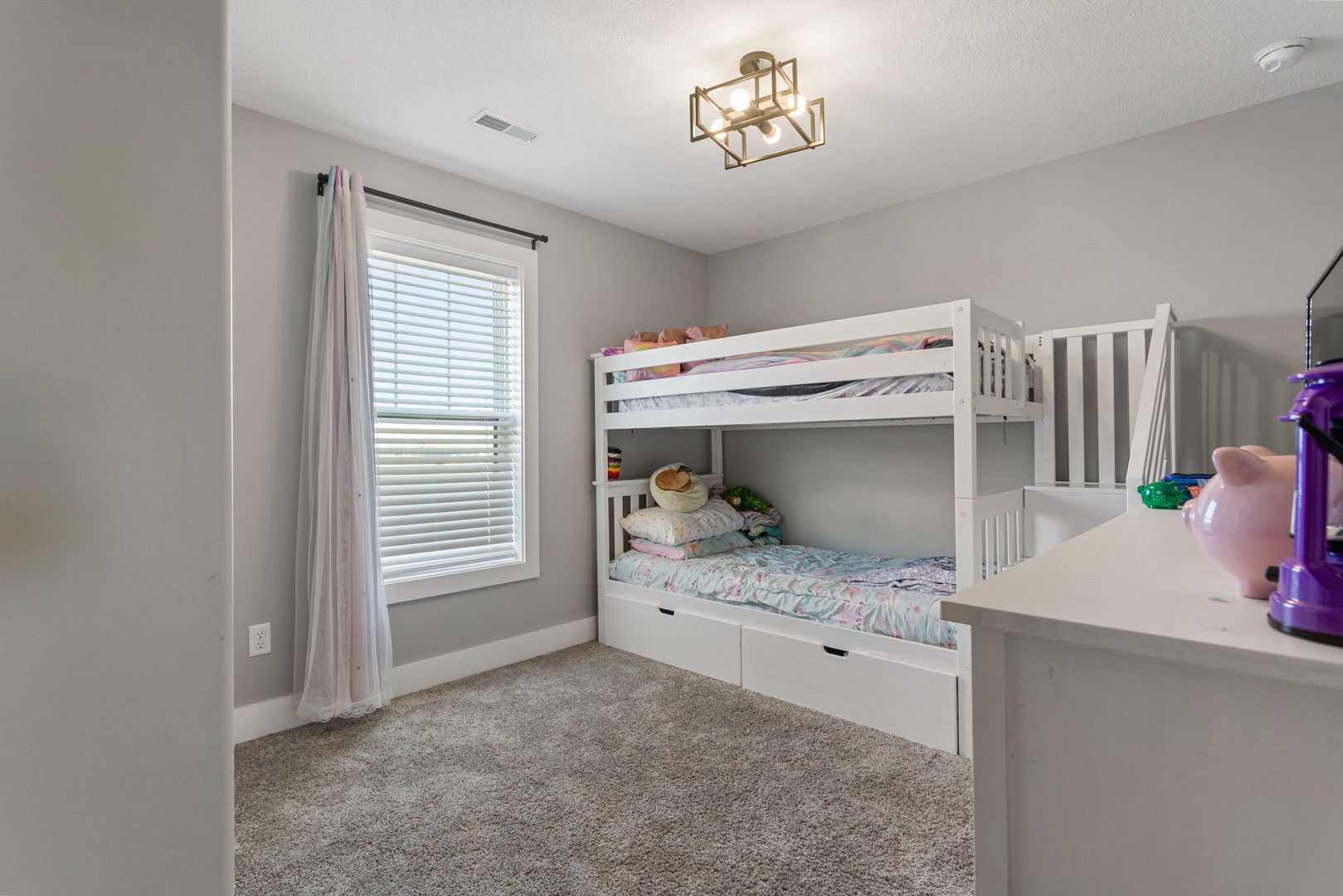 103 Wildflower Heyworth, IL 61745 - Photo 22 of 39 a bedroom with a bed and a window