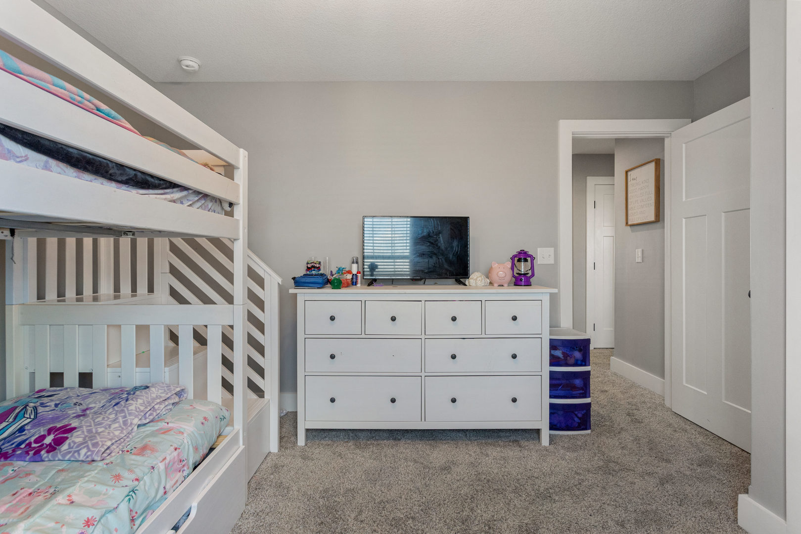 103 Wildflower Heyworth, IL 61745 - Photo 23 of 39 a view of bedroom with furniture and flat screen tv