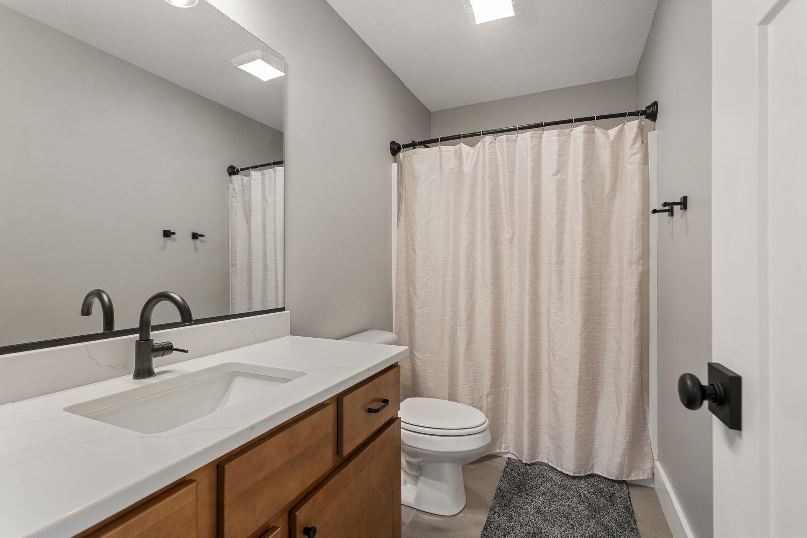 103 Wildflower Heyworth, IL 61745 - Photo 27 of 39 a bathroom with a sink and a toilet