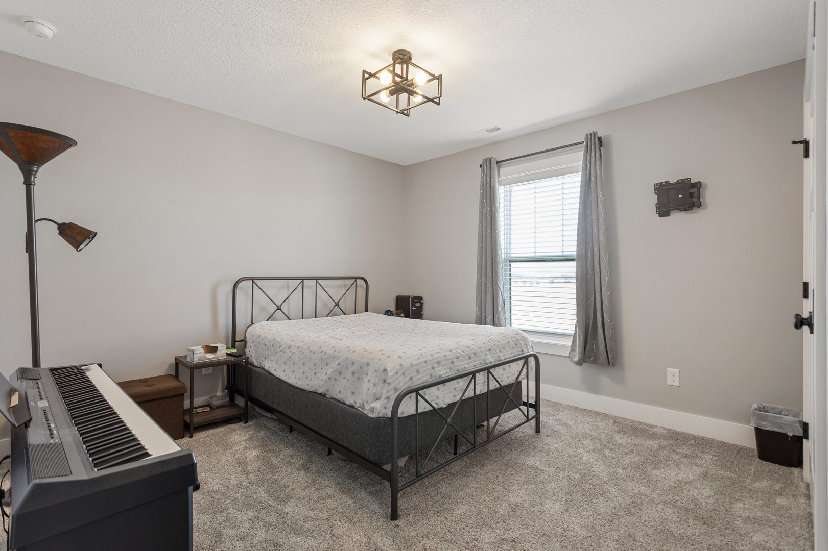 103 Wildflower Heyworth, IL 61745 - Photo 28 of 39 a bed room with a bed and a window