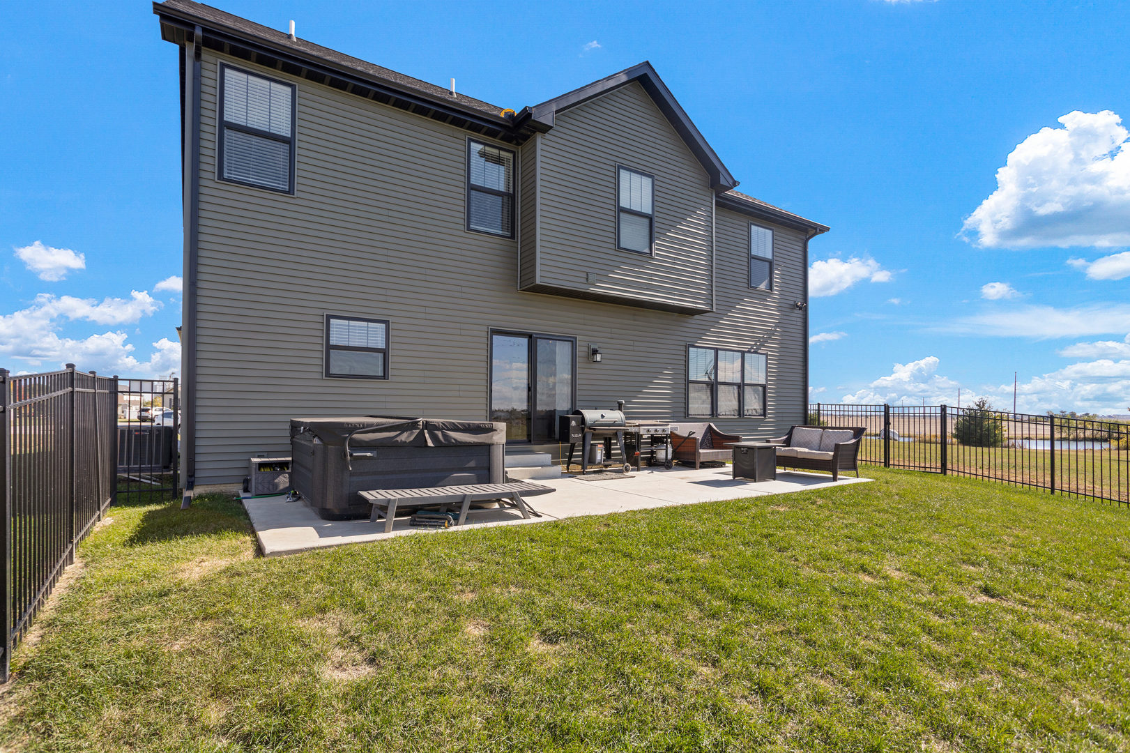 103 Wildflower Heyworth, IL 61745 - Photo 34 of 39 a view of a house with patio