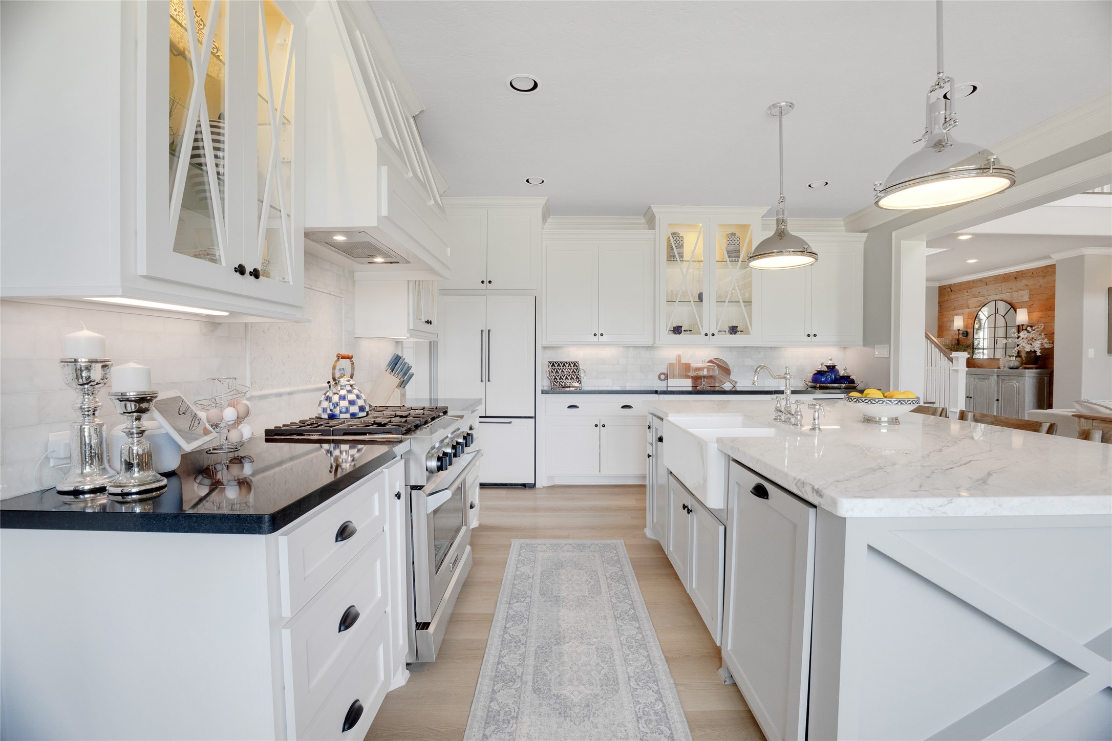 40499 Community Road Magnolia, TX 77354 - Photo 13 of 33 a kitchen with stainless steel appliances granite countertop a sink and cabinets