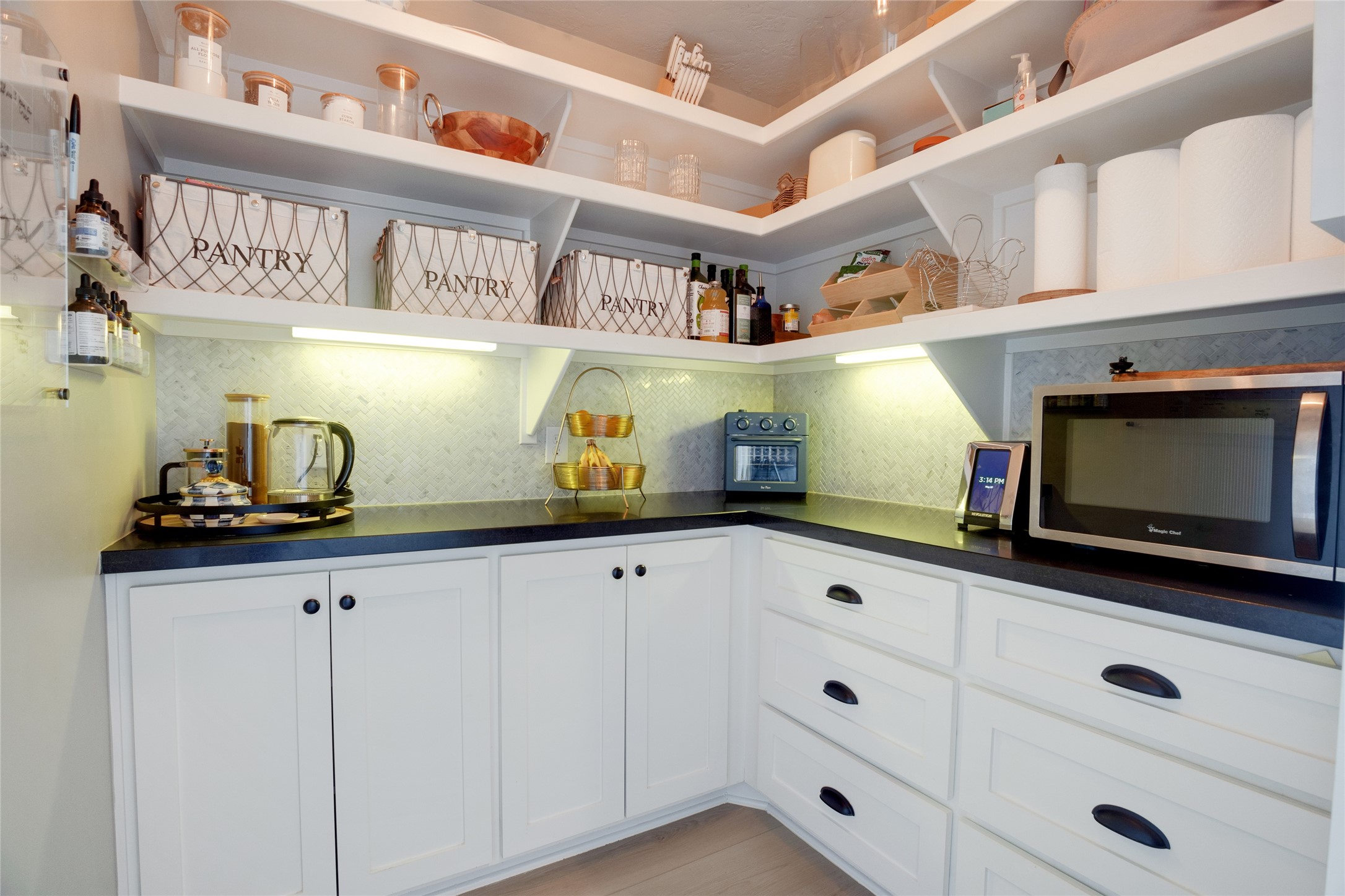 40499 Community Road Magnolia, TX 77354 - Photo 22 of 33 a kitchen with stainless steel appliances white cabinets and a sink