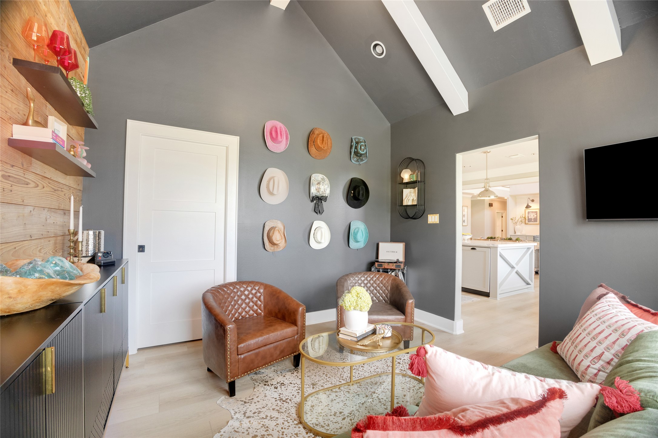 40499 Community Road Magnolia, TX 77354 - Photo 24 of 33 a living room with furniture and a flat screen tv