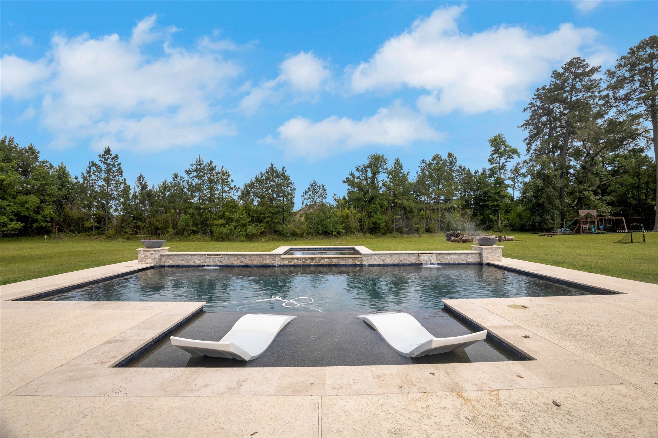 40499 Community Road Magnolia, TX 77354 - Photo 3 of 33 a view of swimming pool with seating space