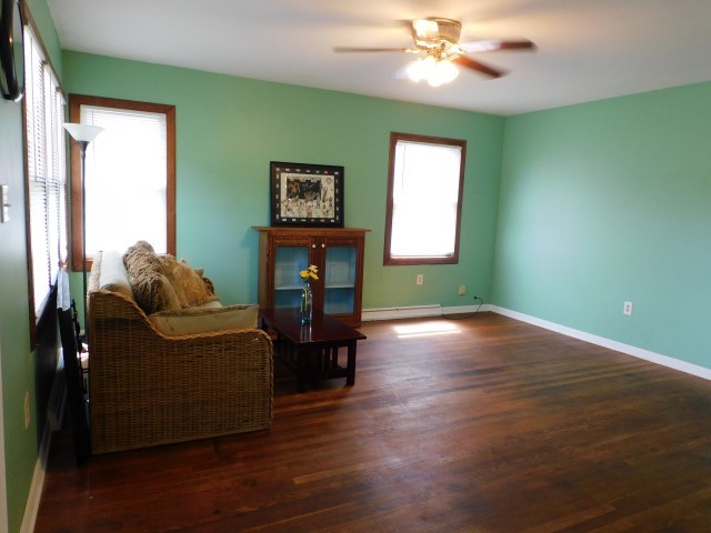 1419 Main Street Spring Grove, IL 60081 - Photo 4 of 27 a living room with furniture and a window