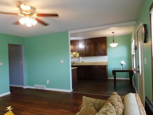 1419 Main Street Spring Grove, IL 60081 - Photo 7 of 27 a view of a livingroom with furniture and chandelier fan