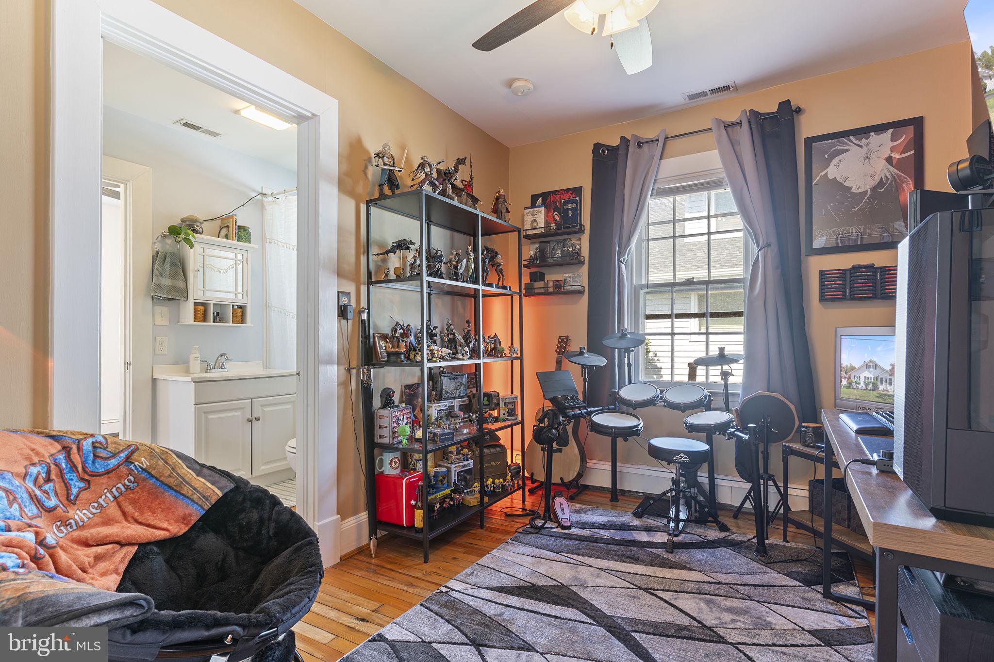 2844 Ridge Road Huntingtown, MD 20639 - Photo 24 of 47 a bedroom with furniture and a window