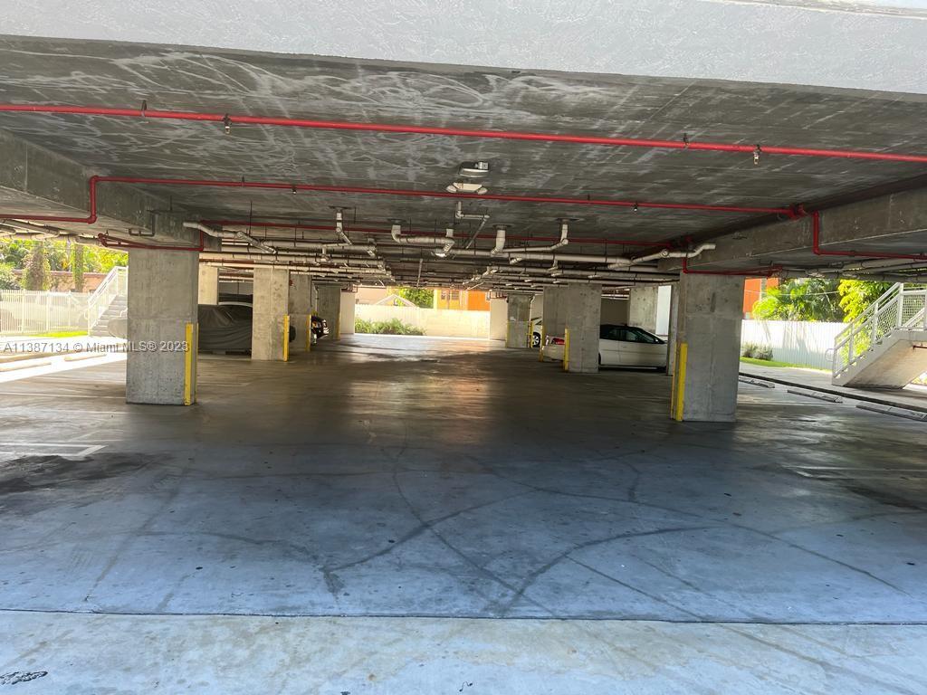 450 Southwest 3rd Street, Unit 4 Miami, FL 33130 - Photo 2 of 10 a view of parking garage