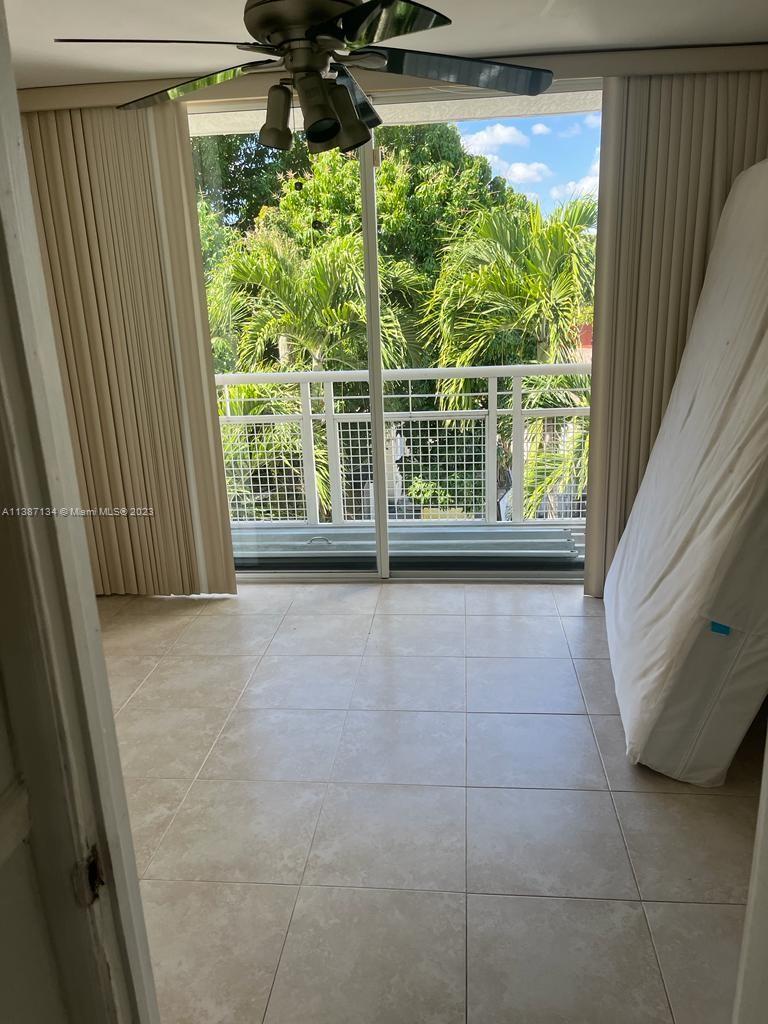 450 Southwest 3rd Street, Unit 4 Miami, FL 33130 - Photo 9 of 10 a view of a porch