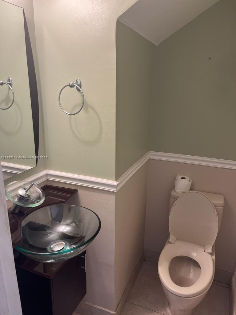 450 Southwest 3rd Street, Unit 4 Miami, FL 33130 - Photo 10 of 10 a bathroom with a toilet and a sink