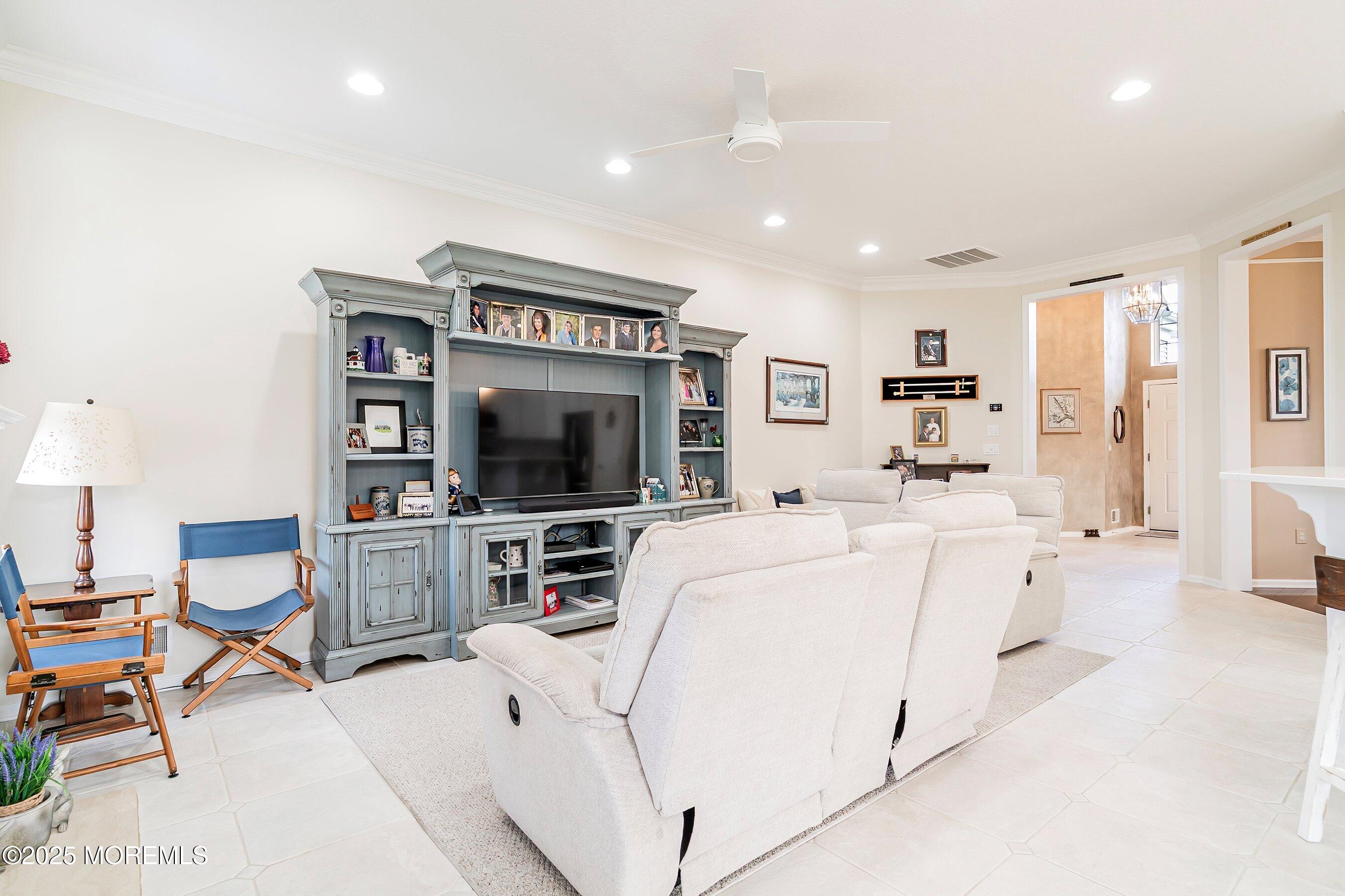 1518 Rabbit Run Manasquan, NJ 08736 - Photo 11 of 54 a living room with furniture and a flat screen tv
