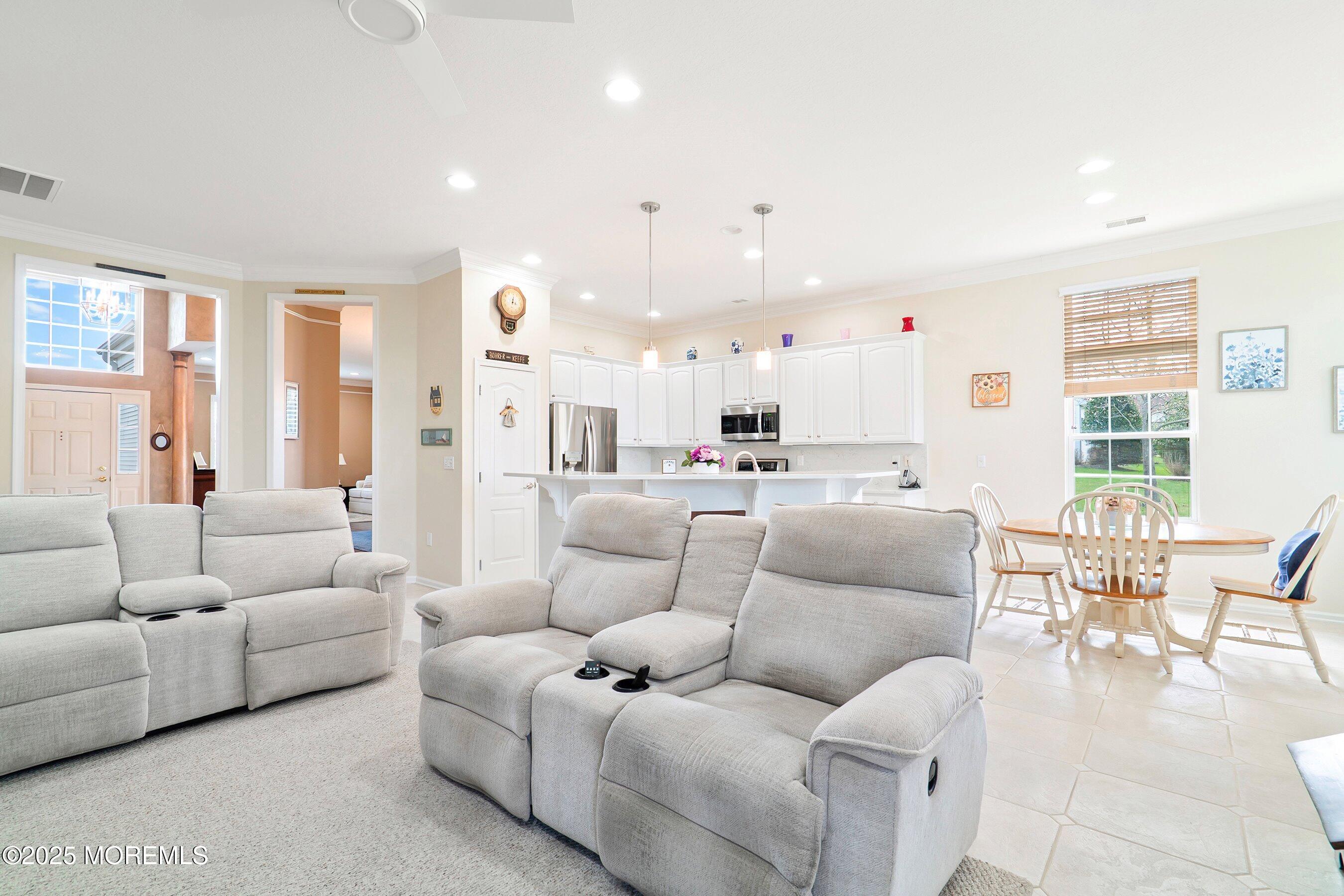 1518 Rabbit Run Manasquan, NJ 08736 - Photo 12 of 54 a living room with furniture and a large window