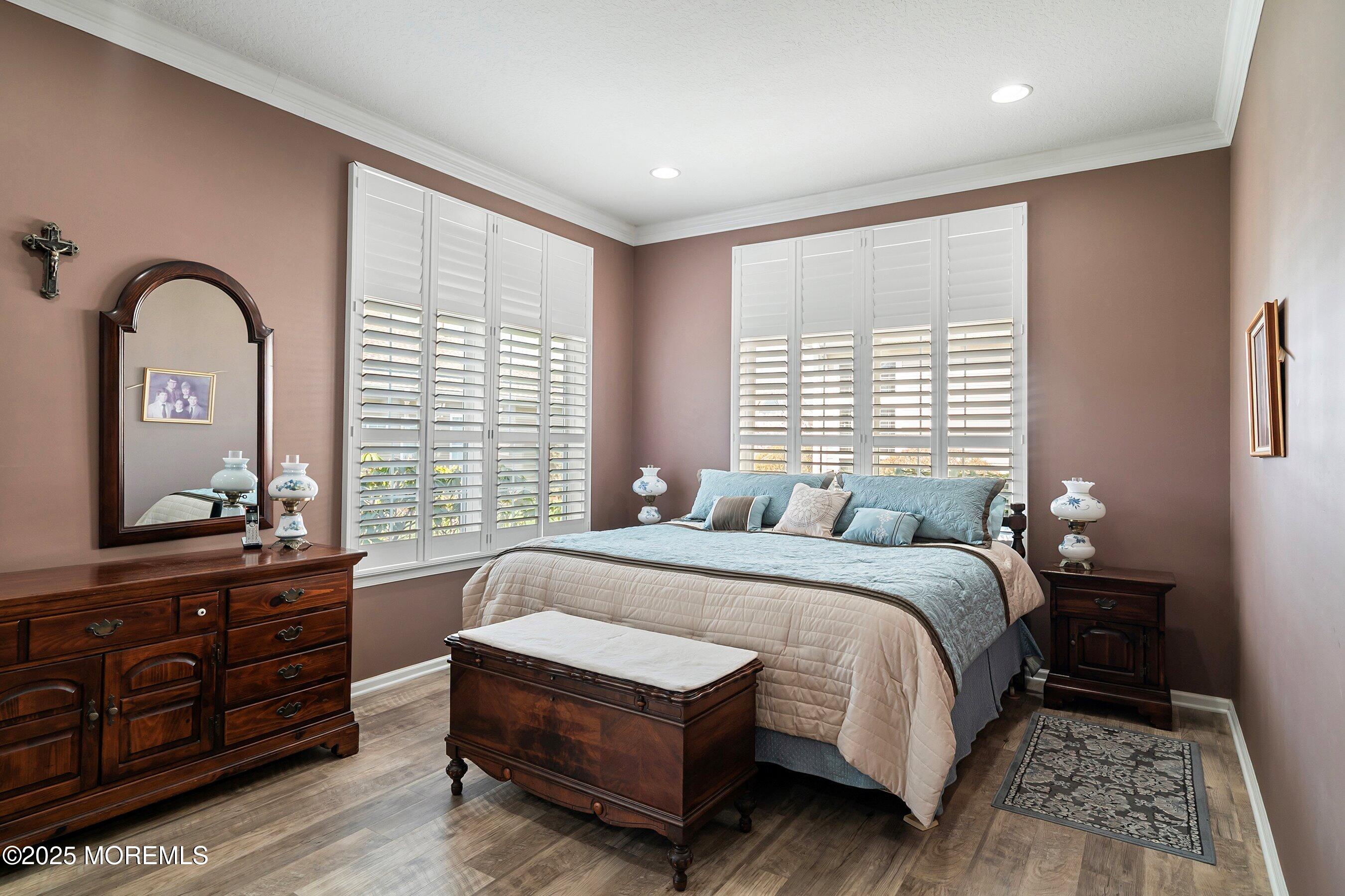 1518 Rabbit Run Manasquan, NJ 08736 - Photo 23 of 54 a bedroom with a bed and a dresser