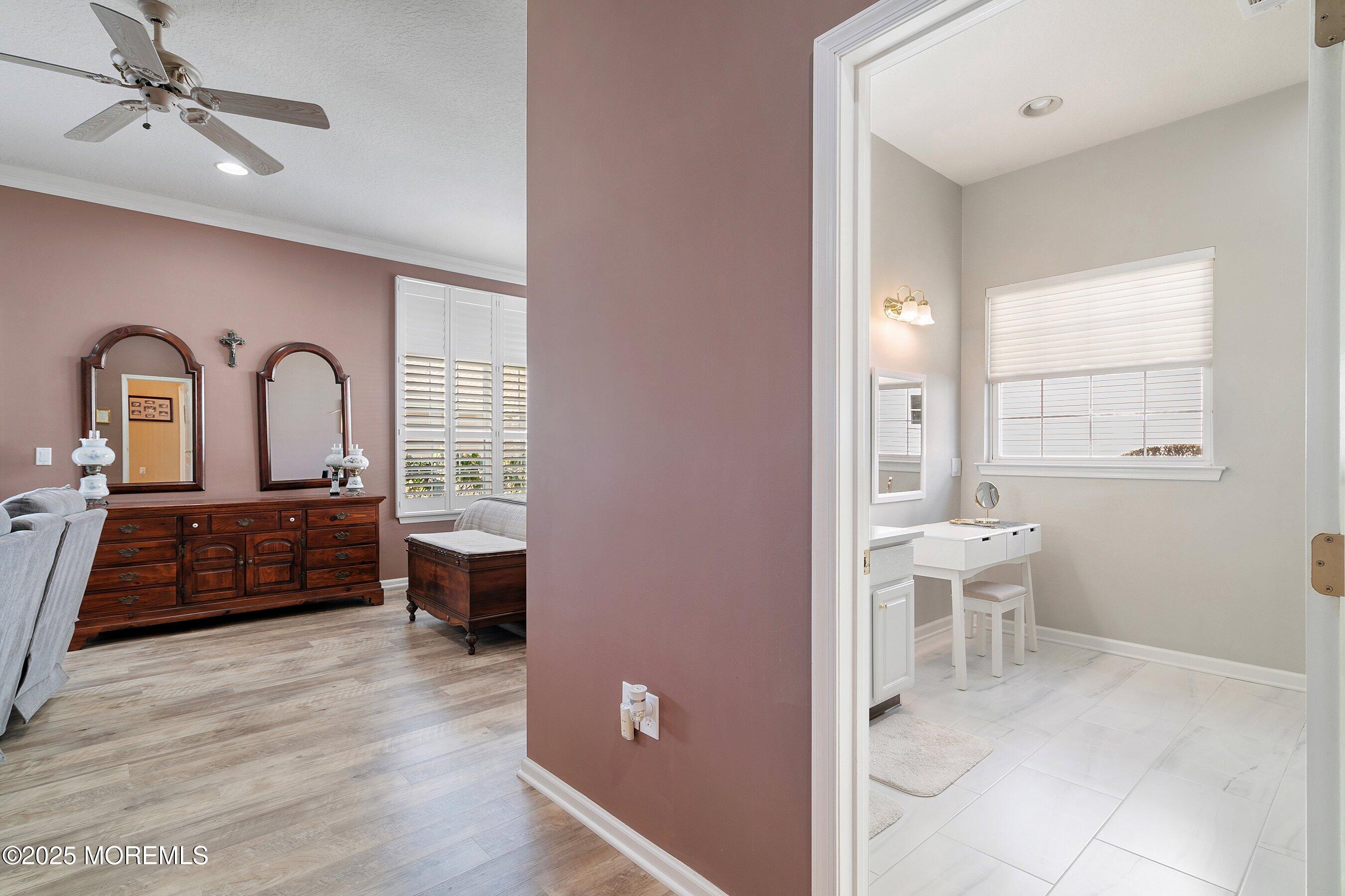 1518 Rabbit Run Manasquan, NJ 08736 - Photo 26 of 54 a view of hotel room with a large window and wooden floor