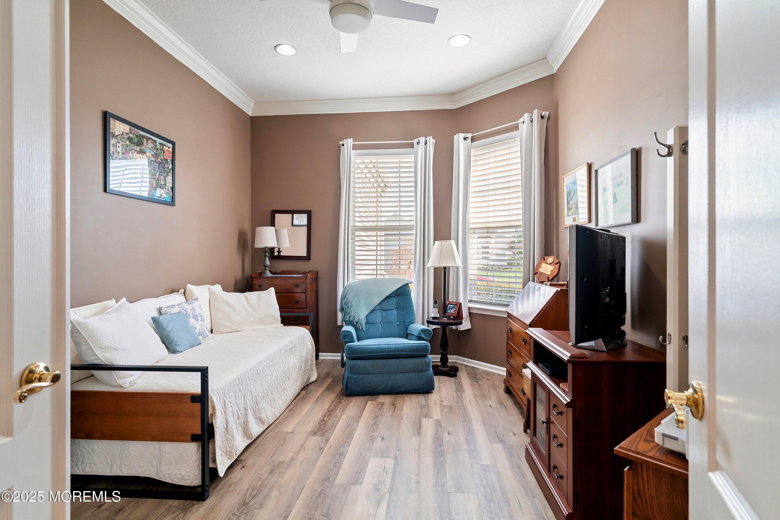 1518 Rabbit Run Manasquan, NJ 08736 - Photo 33 of 54 a bedroom with a bed and wooden floor