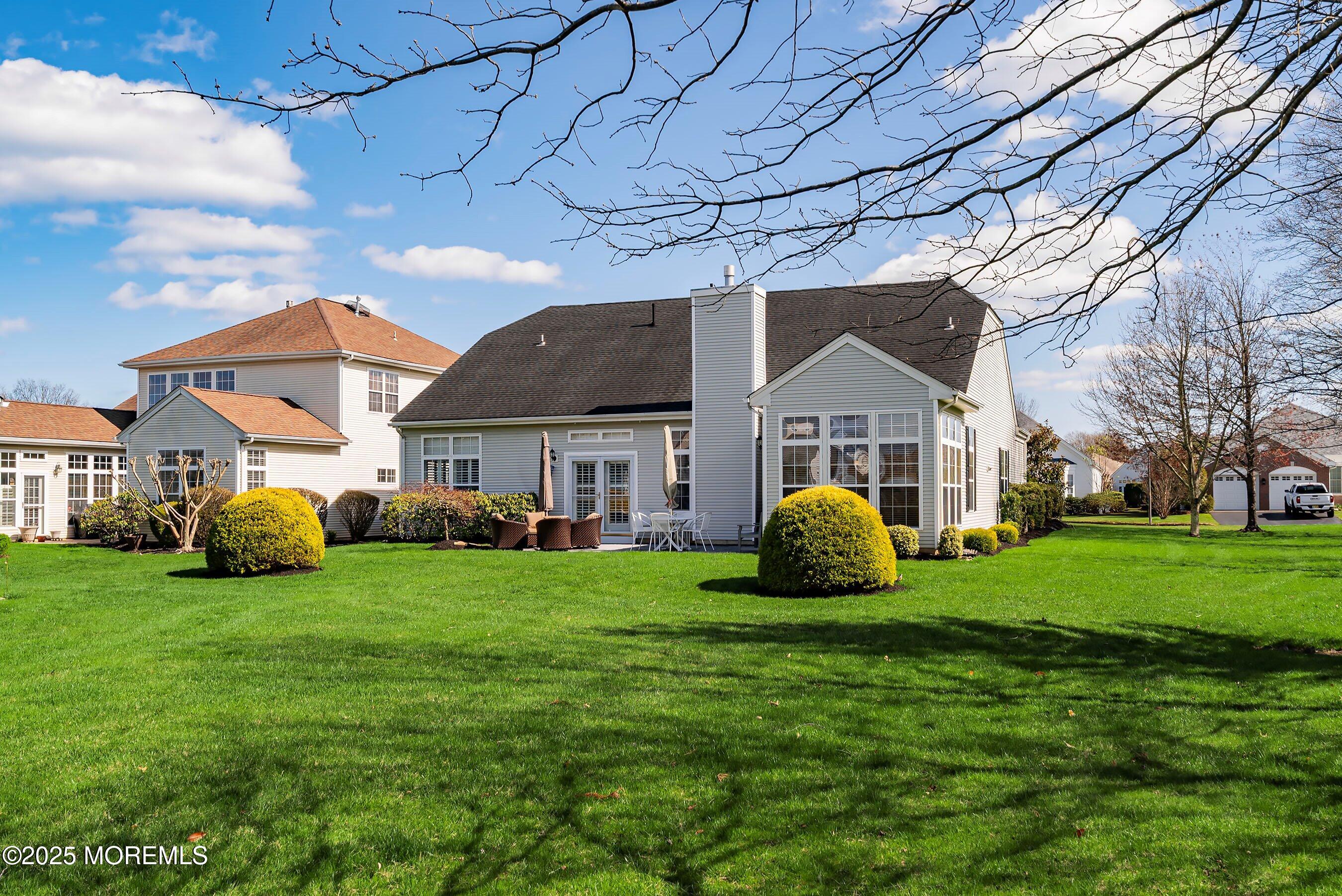 1518 Rabbit Run Manasquan, NJ 08736 - Photo 38 of 54 a view of a house with backyard