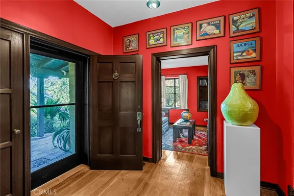 a view of a room with a large window