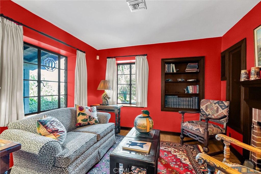 6146 Hawarden Drive Riverside, CA 92506 - Photo 17 of 75 a living room with furniture a flat screen tv and a window