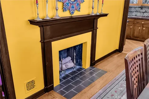 a spacious bedroom with a bed and a flat screen tv