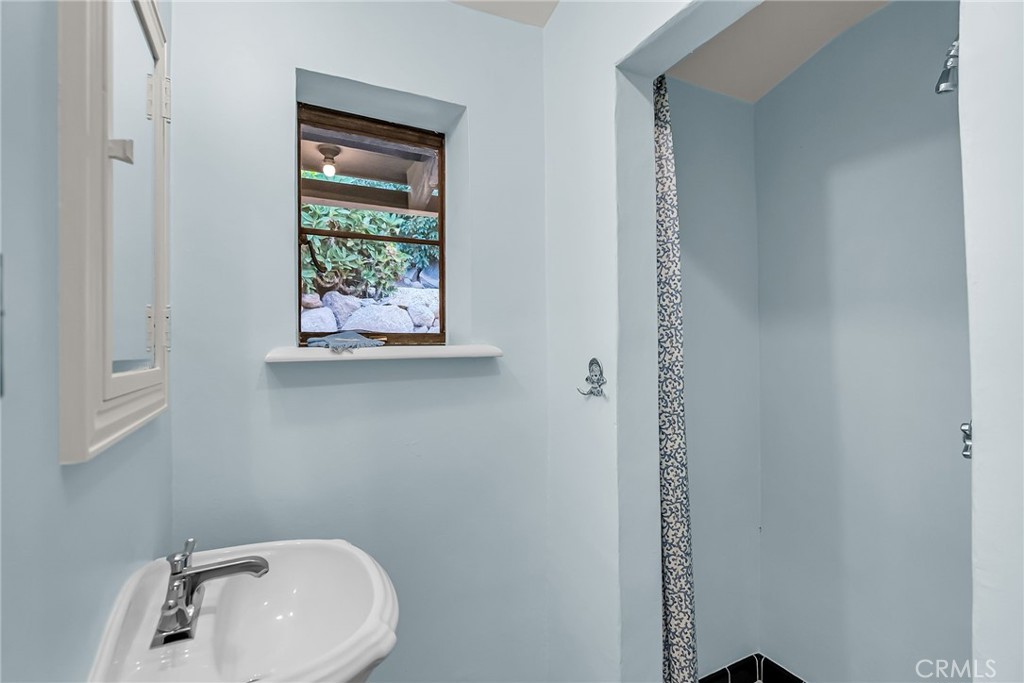 6146 Hawarden Drive Riverside, CA 92506 - Photo 42 of 75 a bathroom with a sink and a toilet