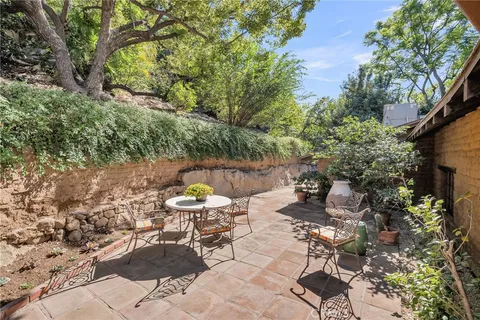 a view of porch with wooden floor