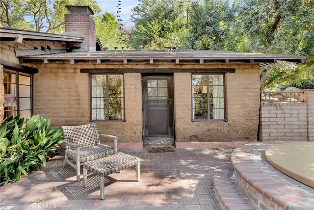 a white bench sitting in the middle of a building