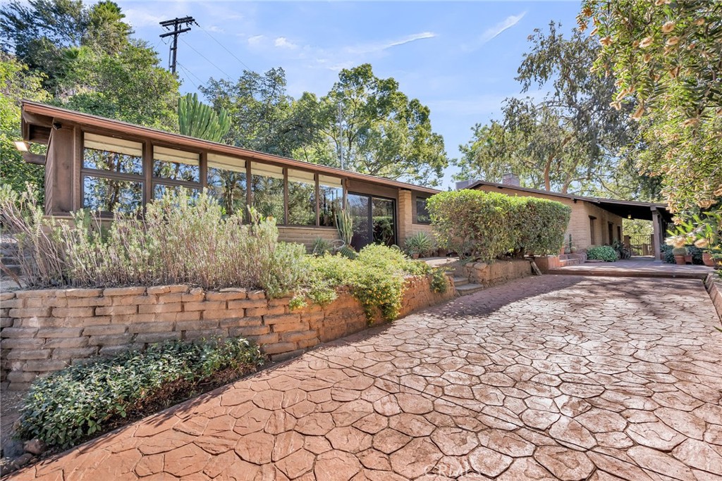 6146 Hawarden Drive Riverside, CA 92506 - Photo 61 of 75 a view of a backyard with pathway