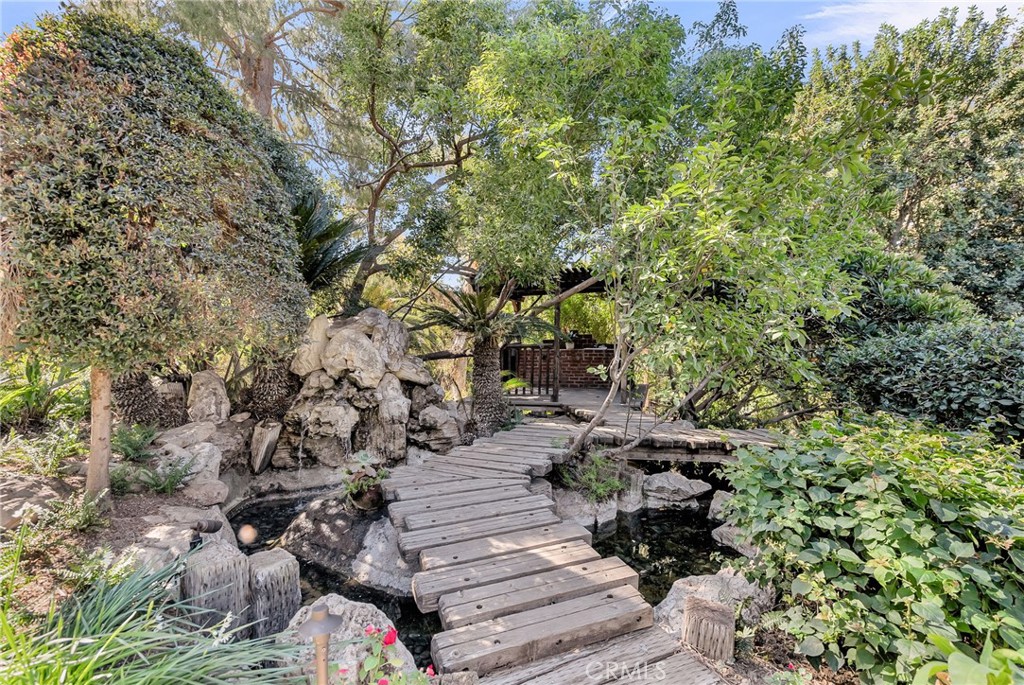 6146 Hawarden Drive Riverside, CA 92506 - Photo 65 of 75 a backyard of a house with lots of green space