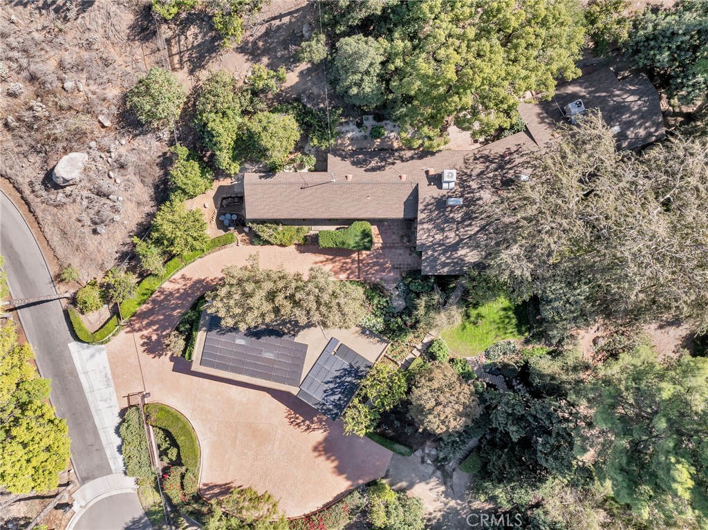 6146 Hawarden Drive Riverside, CA 92506 - Photo 70 of 75 an aerial view of a house with a yard and garden