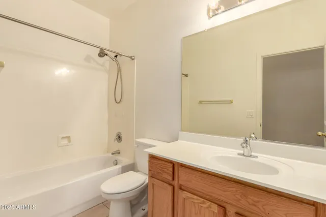 a bathroom with a sink a toilet and a bathtub