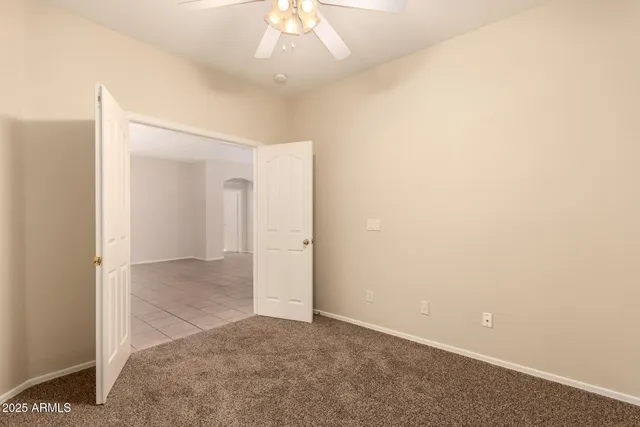 an empty room with a bathroom