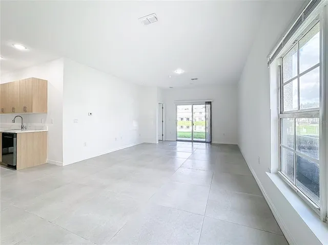 an empty room with windows