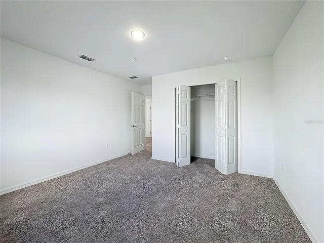 an empty room with closet