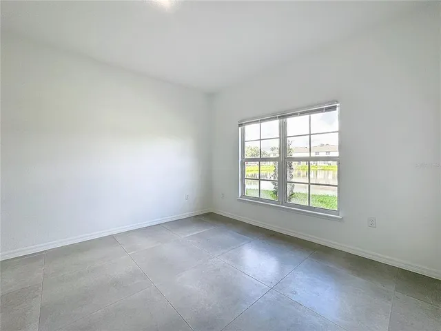 a view of room with gym equipment